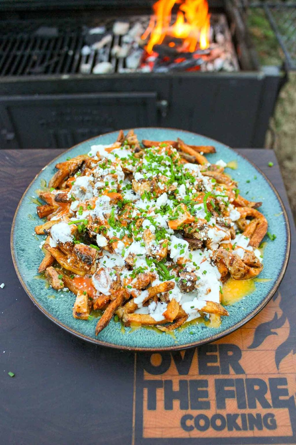 Golden fries loaded with buffalo chicken, cheese, house ranch, and green onions